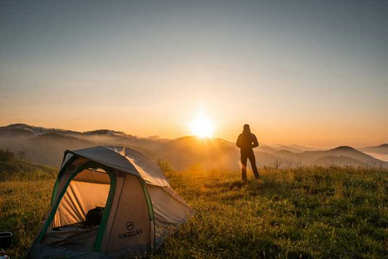 tent and man in setting sun